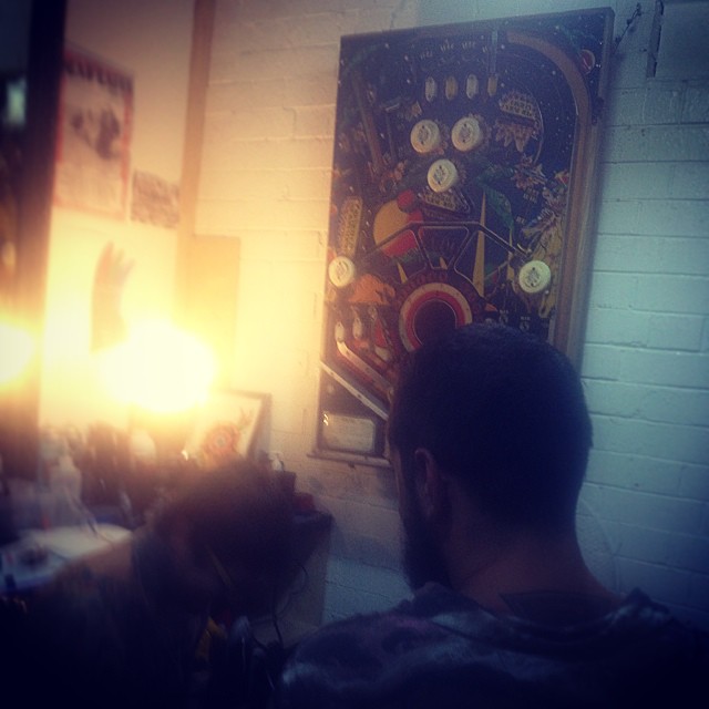 @staybold getting ink from Mitch. Thanks to Dad for getting the pinball top up on the wall #freehaircutsforlife again